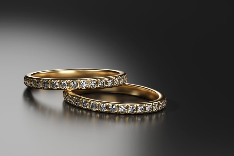 gold-diamond-rings-placed-glossy-background-macro-object-3d-rendering